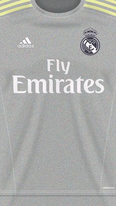 the real madrid jersey is shown in grey and yellow