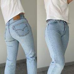 "Vintage Levi's 501 w27 L25 made in USA  stone Wash light blue faded vintage 501s Follow on Instagram for new listing  Vintage Denim Edit   100% Cotton no stretch. Please make sure size is good for you as no returns.  please read measurements before buying and ask any questions no returns Ask questions if you need help please don't buy without checking.  Measurements taken laying flat.  please read measurements below before buying   Lovely light blue USA button 524 Cut at hem  Waist 35cm/13.7\" across flat (The 27.5\"total) Crotch to waist 28.5cm 11.2\" Hips 53cm\" across flat 20.8\" total 41.7\"  Thigh across flat 27cm/10.6\" across  inside leg from crotch 63cm 25\"  Ankle 18.5cm/ 7.2\" across flat  If you have a pair of vintage Levi's compare measurements to get the best fit. Also always 501 Outfit, Levis 501 Women, Light Wash Levis, Jean Vintage, Vintage Levis 501, Levi’s Jeans, Levi’s 501, Black Long Sleeve Top, Follow On Instagram