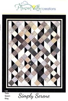 a black and white quilt with the words simply scene on it