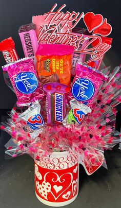 a valentine's day candy bouquet in a cup