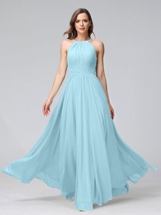 a woman wearing a long blue bridesmaid dress