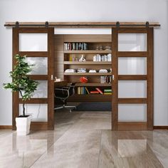 an open door leading to a desk and bookshelf