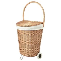 a large wicker basket with wheels on the front and side, holding a white lid