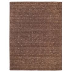 a brown rug with small dots on the top and bottom, against a white background