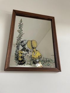 Vintage 1970' Sarah Kay Wall Mirror  with Holly and Hobbie kissing the boy in the corner of the mirror. Yellow flowers are at the bottom and the side.  - Dimensions: Height 33cm x width 25 cm  - Condition: Great, no cracks, small marks at the bottom of the mirror, hardly visible. VINTAGE CONDITION: Please keep in mind that all of our objects are vintage and may exhibit normal wear and age. Any significant flaws are mentioned in the description and seen in the photographs. Please feel free to con Sarah Kay Vintage, Mirror Wall Hanging, Sarah Kay, Holly Hobbie, Home Decor Mirrors, Wall Mirror, Mirror Decor, Yellow Flowers, The Netherlands