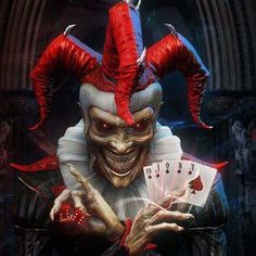 an evil clown holding playing cards in his hands