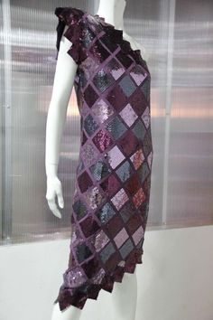 For Sale on 1stDibs - 1980s custom-made, one-shoulder, sequin and satin dress, in burgundy and gunmetal harlequin pattern. Saw tooth hem and decolletage with a structured stand-up Harlequin Pattern, Saw Tooth, 1980s Dresses, Pattern Fabric, Satin Dress, Dress Vintage