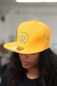 With unique designs you won't find anywhere else, our caps are the quality type that are designed with a thicker woven fabric. Not those flimsy weak ones that lose shape. 6-Panel. 100% stitched embroidered design. Flat brim. Dry clean only. Comes in: Snapback and FlexFit. Perfect for those SOPHISTICATED ladies who need a cap for all casual, sports and/or fitness occasions. Embroidered Logo Snapback Hat With Flat Bill, Fitted Cotton Snapback Hat With Flat Bill, Adjustable Snapback With Embroidered Logo, Embroidered Logo Baseball Cap With Flat Brim, Embroidered Logo Flat Brim Baseball Cap, Yellow Adjustable Fitted Cap, Yellow Adjustable Flat Bill Snapback Hat, Adjustable Fitted Hat With Embroidered Logo And Flat Bill, Adjustable Yellow Fitted Hat With Curved Brim