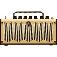 an old style radio with four different knobs on the front and one is gold