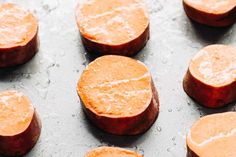 cooked sweet potatoes on a baking sheet ready to cook