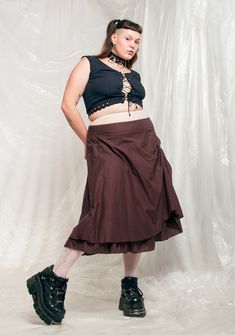 Ruched vintage skirt, a real Y2K gem in mint condition. It's made of pure brown cotton and has a zip closure. Save the planet & ditch fast fashion once and for all! Our model, Sawa is 170 cm / 66.3" tall and she's a size XXL. Size: XXXL / US 14 / UK 18 / IT 50 Other size info: Labelled size: EUR 50 Measurements:  waist: 104 cm / 40.6" length: 74 cm / 28.9" Fabric: cotton  Care: Machine wash cold Brown Vintage Tiered Skirt, Vintage Brown Tiered Skirt, Aesthetic Plus Size, Real Y2k, Slip Dress Y2k, Plus Size Y2k, Plus Size Skirt, Vintage Slip Dress, Skirt Y2k