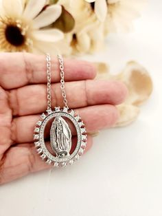 Virgin Guadalupe Silver Necklace - Virgin Mary Jewelry, Minimalist Catholic Necklace  Virgin Guadalupe, Christmas Gift Idea, Mexican Gift Elegant and meaningful, this silver necklace features a stunning Virgin of Guadalupe medallion, perfect for daily wear or as a thoughtful Catholic gift. Made with a durable stainless steel chain, it's a timeless symbol of faith and devotion. Design: Virgin Mary Medallion Style: Religious Jewelry, Catholic Necklace Ideal for layering or as a standout piece. Per Virgin Guadalupe, Guadalupe Necklace, Mexican Gifts, Mary Necklace, Catholic Necklace, Virgin Mary Necklace, Godmother Gifts, Catholic Jewelry, Jewelry Minimalist