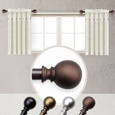 an assortment of black and gold knobs in front of a window with white curtains