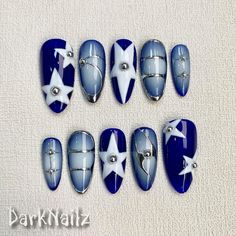 Custom Blue Press On Nails, Y2K Spring Summer Stars Nails bring a touch of nostalgia and futuristic style to your fingertips. With a wide range of colors, designs, and finishes, these press on nails allow you to express your individuality and stay on top of the latest trends. Whether you prefer bold and vibrant shades or subtle and sophisticated designs, DarkNailz press on nails offer endless possibilities for creating your desired look. [PLEASE READ BEFORE PURCHASING] All sets are made with GEL nail polish. These nails are reusable, if you take it off right. For instruction, please message me. Each set comes with 10 handmade press on nails, double-side gel nail glue, a mini buffer, a cuticle stick, a prep pad. 1. Measurements Please measure your own nail and find your size from our pictur Blue And Green Gel Nails, Unc Blue Nails, Winter Nail Art Short Nails, Simple Navy Blue Nails, Blue Simple Nails, Nail Inspiration Blue, Kpop Inspired Nails, Red And Blue Nails, Kitsch Nails