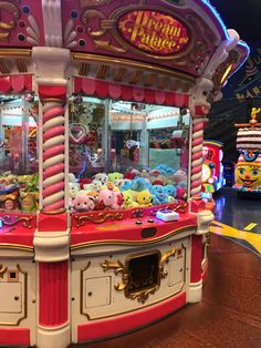 an amusement park ride with stuffed animals on the front and sides, as well as children's toys