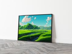 an empty room with a large painting on the wall and wood flooring in front of it