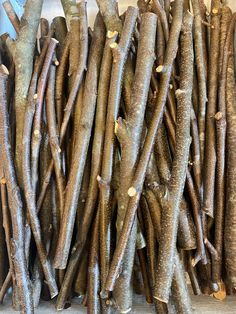 several sticks are stacked up together on the table