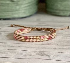 a close up of a bracelet on a table