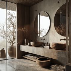 a large bathroom with two sinks and mirrors