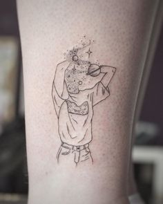 a person with a tattoo on their leg