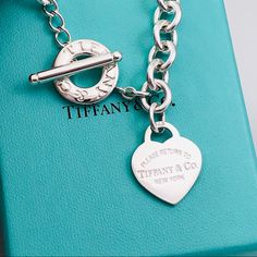 *** Price Is Firm Please *** Guaranteed 100% Authentic Tiffany & Co. Return To Tiffany Heart Tag Toggle Necklace. Chain Measures 16.5” From Clasp To Clasp. Heart Measures 1" X 0.80". Tiffany Box Shows Signs Of Use / Age But I May Have A New One For Purchase If You Message Me. Return To Tiffany Toggle Necklace, Tiffany Toggle Necklace, Heart Tag Toggle Necklace, Heart Toggle Necklace, Tiffany Birthday, Tiffany Party, Chanel Party, Tiffany And Co Necklace, Tiffany Box