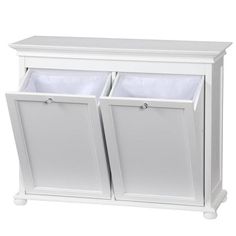 a white cabinet with two bins on top