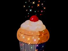 a cupcake with white frosting and a cherry on top is surrounded by stars