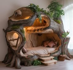 a bed made out of tree stumps in a room with stairs leading up to it