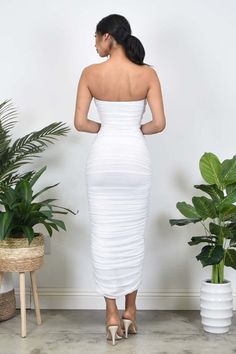 Look your best in this beautiful White Strapless Ruched Bodycon Maxi Dress. Constructed with a strapless design and ruched detailing for an undeniable figure-flattering silhouette, this dress provides maximum comfort thanks to its soft and stretchy materials. Perfect for an array of special occasions. Bodycon Maxi Dress, Winter Knit Hats, Bodycon Maxi Dresses, Boot Accessories, Look Your Best, Winter Knits, Sunglass Frames, Stretchy Material, Boots Men