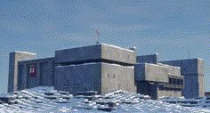 a large building made out of blocks in the snow