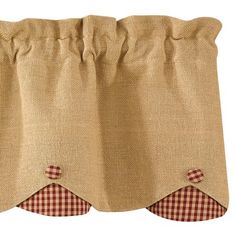 a pair of burlocked valances with checkered checks on them