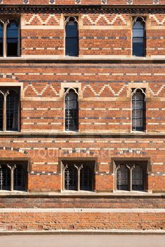 an old brick building with arched windows