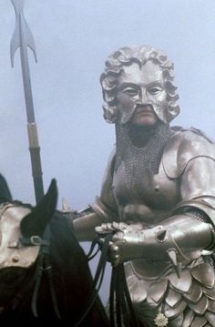 a statue of a man in armor on a horse