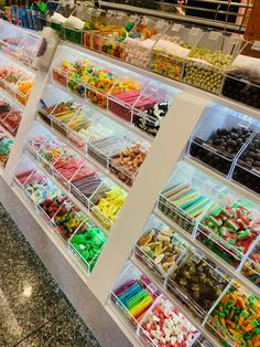 a display case filled with lots of different types of candies