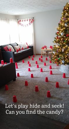 a christmas tree with red cones on the floor