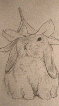 a drawing of a bunny with a hat on its head