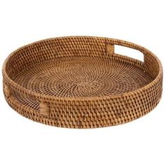 a round wicker tray with handles