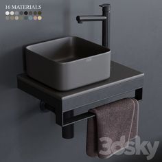 there is a square sink and towel rack in the bathroom with towels hanging on the wall