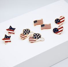 Perfect as a gift for friends and family or as a special treat for yourself, our US flag earrings are a must-have accessory for anyone who loves to show their American pride. These earrings are a beautiful way to add a touch of Americana to any outfit.  Flag - 1.8cm*0.9cm Cowboy Hat - 2.7cm*1.6cm Star - 1.7cm*1.7cm Heart - 1.9cm*1.5cm These earrings are ready to ship in 1 - 3 business days To ensure lasting beauty and shine, follow these simple care instructions: * Handle with Clean Hands: Always handle your enamel stud earrings with clean and dry hands to prevent the transfer of oils, dirt, or lotions onto the enamel surface. * Avoid Contact with Chemicals: Enamel can be sensitive to chemicals found in perfumes, cosmetics, hairsprays, and cleaning products. Put on your earrings after appl Patriotic Nickel-free Earrings For Gift, Flag Earrings, Patriotic Earrings, Enamel Stud Earrings, Chapeau Cowboy, Cow Boy, Water Activities, Enamel Earrings, American Pride