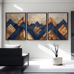 a living room with two paintings on the wall