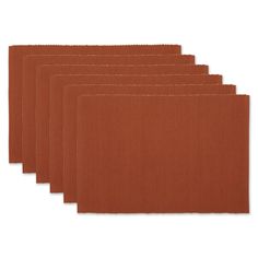 six orange placemats on a white background