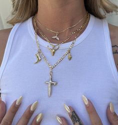 The ultimate handcrafted coastal cowgirl statement necklace stack. if you love a seashell necklace - this is for you! A great gift for women, made on 18K golf-filled chain, this layered handmade necklace comes with an opal whale tale, shell, boot, bull head, and opal pearl cross. Where beachside allure and coastal vibes meets western wear, this necklace set is the trendy, aesthetic charm necklace of your dreams - a unique layered piece that tells a story! On this high-quality, 14K gold handmade Coastal Cowgirl Jewelry, Beach Cowgirl Aesthetic, Western Necklace Stack, Stacked Western Necklaces, Gold Shell Necklace With Starfish Charm, Cowgirl Jewelry Island Cowgirl Jewelry, Western Jewelry Necklace, Ocean-inspired Strand Necklace With Starfish Charm, Whale Tale