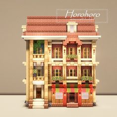 a small model of a building that is made out of wood and has plants growing on the windows