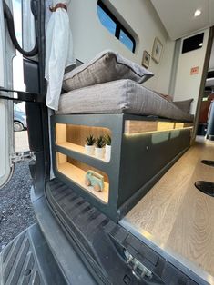 the bed in the back of a truck is made to look like it has been built into