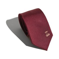 Elevate your style with Lost Pattern's exquisite silk tie, perfect for both women and men. This sophisticated accessory is designed to add a touch of flare and personality to any outfit. Handcrafted from the finest silk and adorned with delicate embroidery of "cherries", our silk tie showcases a playful yet elegant design. This subtle detail adds a charming twist to your look, making a statement of individuality and style. Product Information: 100% silk tie for men & women 57" x 2. 8" (146x7cm) Embroidery Gifting perfect box included Dry clean Only Elegant Silk Neckwear For Weddings, Classic Silk Ties For Wedding, Luxury Silk Neckwear For Formal Occasions, Elegant Standard Tie With Satin Finish, Elegant Red Suit And Tie Accessories For Gift, Elegant Burgundy Suit And Tie Accessories For Business, Elegant Satin Finish Tie, Elegant Satin Ties For Business, Elegant Satin Neckwear For Formal Occasions