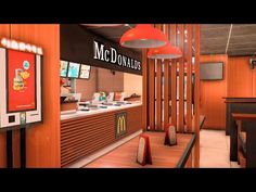 the interior of a fast food restaurant with mcdonald's menus on the wall