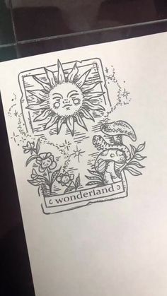 a drawing of a sun and flowers on a piece of paper with the words wonderland written below it