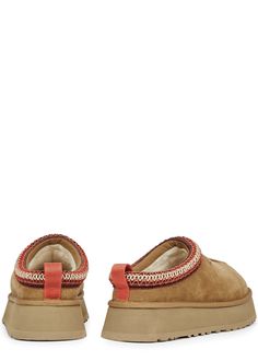 Long Description#Info & Care# Ugg suede mules  Flatform measures approximately 1.5 inches/ 40mm  Water-resistant, embroidered piped trim, grosgrain heel tab, designer-stamped side, shearling lining, seam detail, rubber outsole suitable for outdoor wear, round toe  Slips on  #Size & Fit# Only available in full sizes, go up to the nearest whole size if you take a half size Ugg Tazz, Platform Mules, Suede Mules, Go Up, Outdoor Wear, Chestnut, Clogs, Water Resistant, Slip On