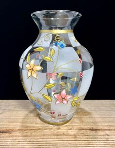 8” ART GLASS VASE - HAND PAINTED Floral VASE frosted In good used pre owned condition. Very pretty with the frosted check and overlay of hand painted flowers and butterfly   Looks lovely with flowers ( see example ) but also looks pretty simply on display  8” tall 5.5” wide Thanks for looking  PLEASE NOTE - your satisfaction is important to us - if for any reason you are not happy with your purchase please message us so we are able to resolve for you.  In addition be aware that we use biodegradeable renatured peanuts that have a slightly strange smell. Jar Painting, Painted Bottle, Painting On Glass, Painted Glasses, Painting Glassware, Painted Jars, Floral Vase, Hand Painted Flowers, Art Glass Vase