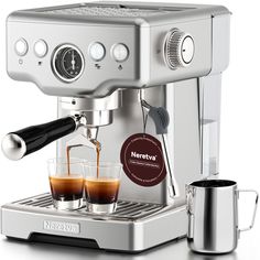 an espresso machine with two cups of coffee